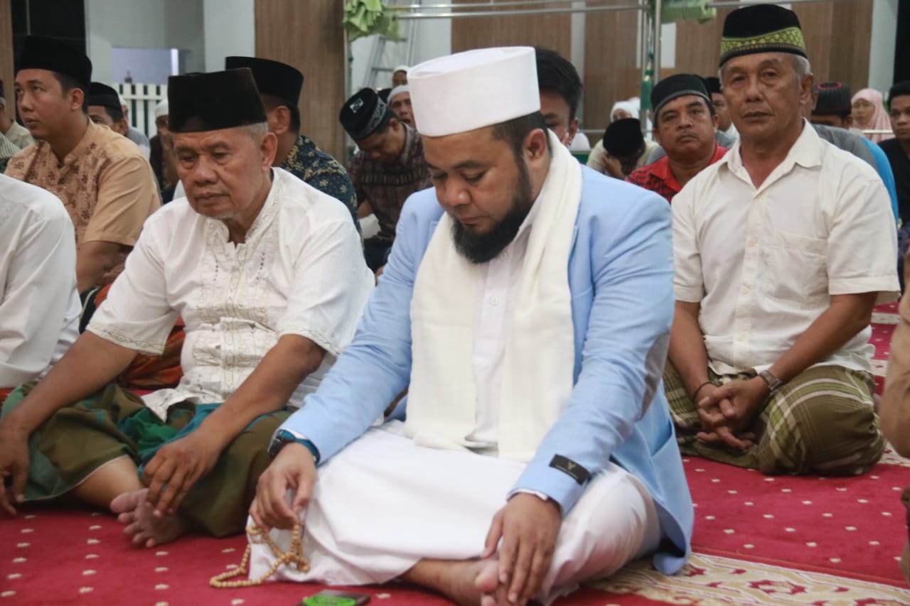 HELMI HASAN